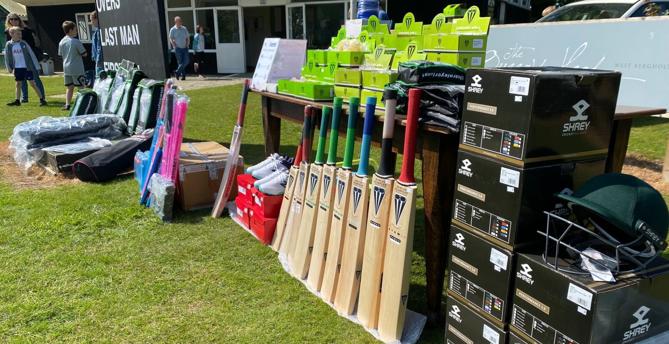 Cricket equipment including bats, helmets, gloves and pads on display at a Centurion pop-up shop